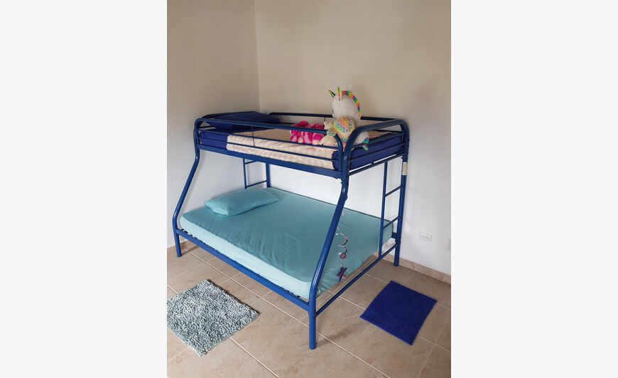 Bunk bed, washing machine, sofa.