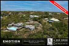 Property of 2 villas with sea view in Terres Basses