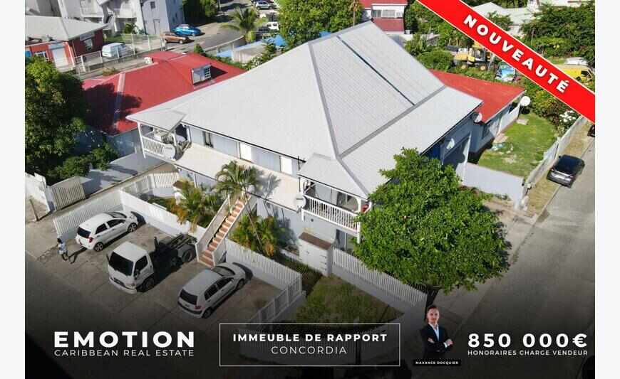 Building with 6 apartments and 6 garages in Concordia.