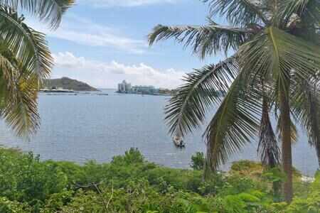 Sous promesse de ...Oyster Pond...Vue lagon magnifique