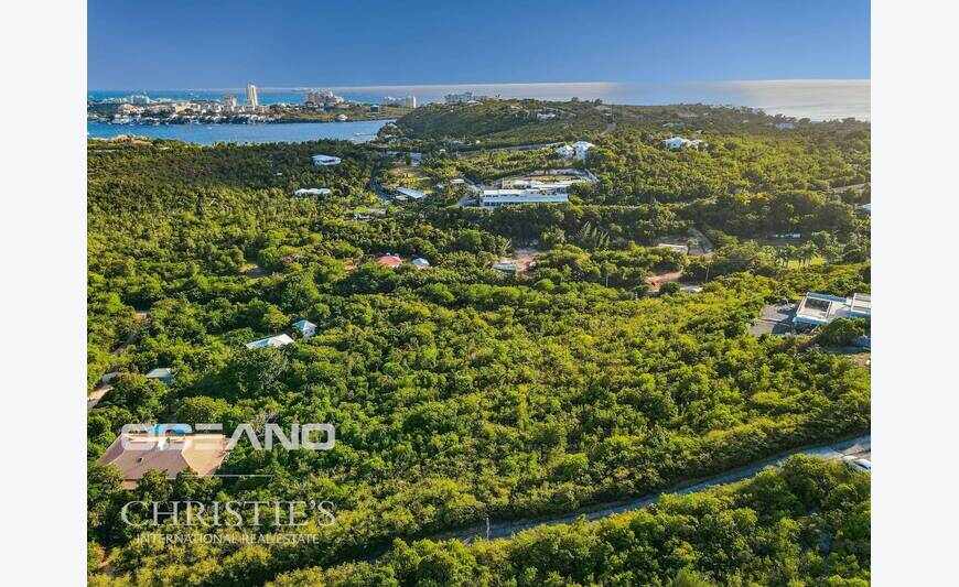 Opportunité unique: Terrain aux Terres Basses avec plans