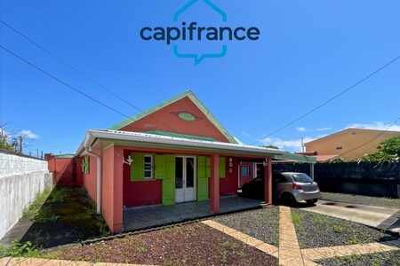 à Saint-André : Deux maisons mitoyennes - ou famille