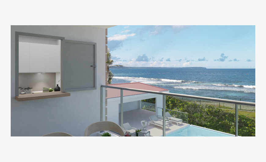 appartement T3 face piscine et face mer en Rdc à Moule