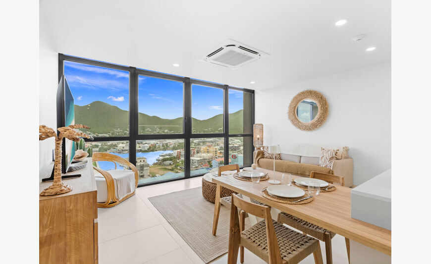 C323 – Appartement élégant avec mur de verre panoramique