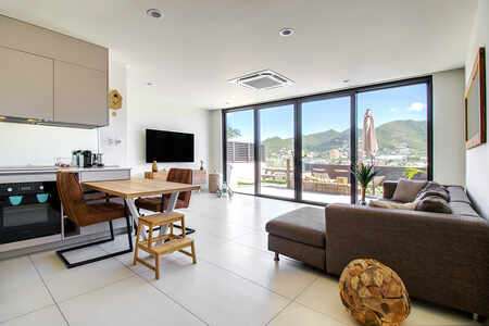 A-107 | Appartement unique de 2 chambres et jardin à The